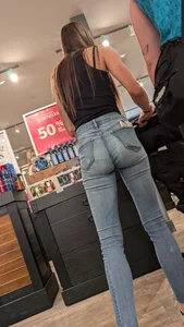 Beauty slim girl with nice ass in tight blue jean. OC