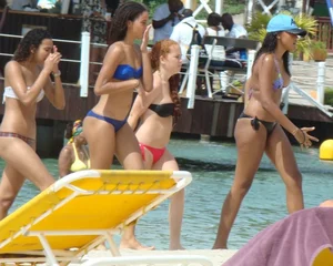 Amazing ebony ass in blue bikini with other sexy friends in bikinis