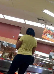 Big booty ebony milf out shopping in tight black leggings