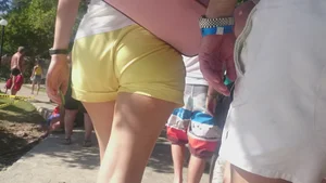 Milf in yellow shorts with vpl and a wedgie