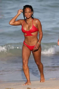 Christina Milian in red bikini in Miami with hard nipples