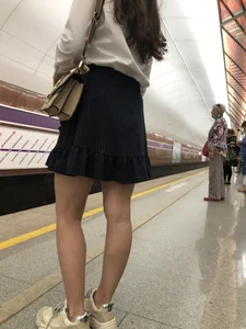 Girl in a Blouse And a Skirt With Great Legs Creepshots Gallery - Standing on the Subway Station, then Sitting With Crossed Legs in a Train