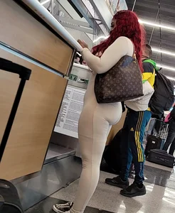 White body suit , booty jus hangin