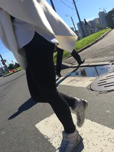 Blonde Girl With Fit Muscular Legs in Tight Black Jeans and Sneakers on a Crosswalk  - Street Creepshots Collection