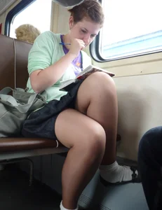 Sexy girls in skirts, stockings and upskirts on the train