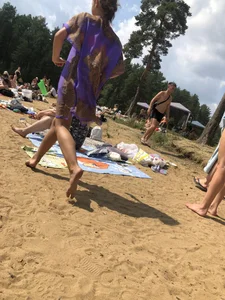 Barefoot Girl in a Dress Running Past Camera at a Beach Series