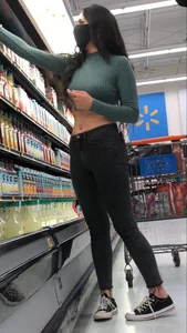 Tight green top and blk jeans at the market