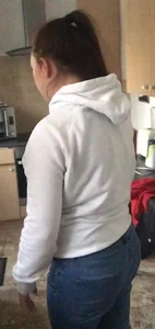 Closeup Hot Candid Pic of a Girl's Butt, Bending Over in Tight Blue Jeans