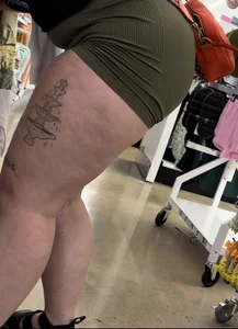 Juicy brunette in green spandex shorts OC
