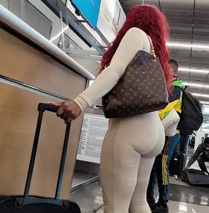 White body suit , booty jus hangin