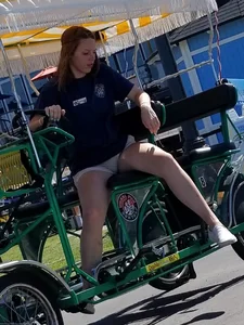 Bike rental girl in tan shorts with cute butt and great legs