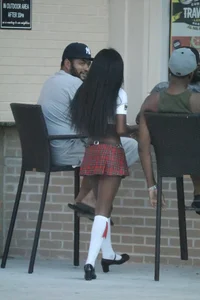 Sexy ebony Tilted Kilt employee in her uniform
