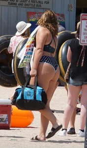 Girls in bikinis getting ready for tubing