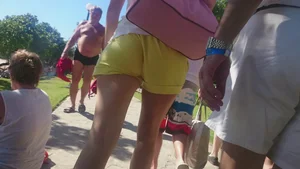Milf in yellow shorts with vpl and a wedgie