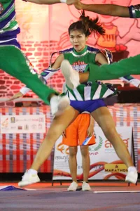 Bunch of athletic Thai cheerleaders at a competition