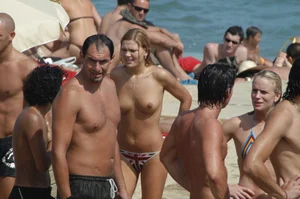 Topless girls on a beach in Barcelona