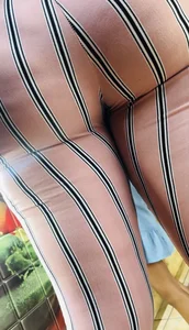 Thick ass in stripped pants in line at subway (extreme close ups)