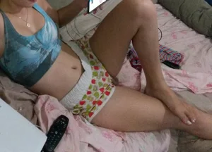 Hot Girl in Shorts and a Top Lying in Bed Home Creepshots
