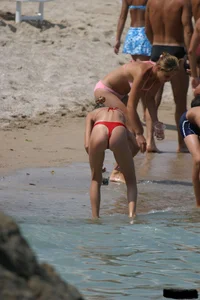 Beach voyeur girls in bikinis, thongs and topless