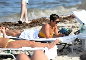 Frankie Bridge nip slips in a bikini on the beach