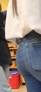 Girl is showing her blue jeans
