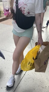 Sexy blonde in green shorts