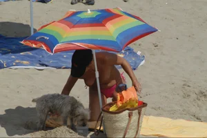 Girls on a nude beach in Sitges, Spain