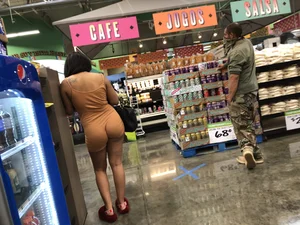 Latina with hard nipples and a big booty in tight spandex shorts outfit
