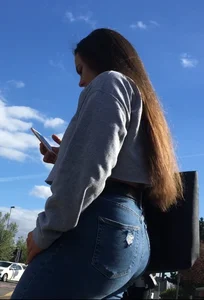 Long haired beauty teen with a tight ass in jeans