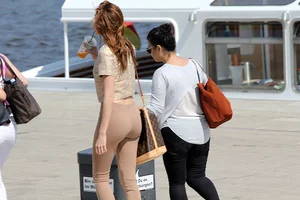 Redhead looking beautiful and sexy in tight pants with a nice ass and showing her panties