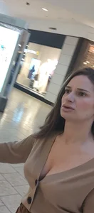 Brunette in brown pants jiggly