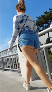 You can almost see half or her ass