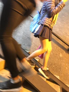 Girl With Skinny Legs in Pahtyhose and a Skirt Walking Down the Stairs Street Candid Gallery