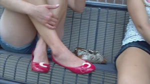 Girl in Jean Mini-Shorts And Flats Sitting With bent Legs Creepshot