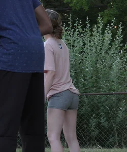Nerdy blonde teen plays in tight short shorts