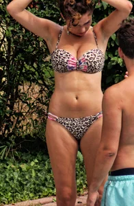Hot big boobed girl in bikini at the pool