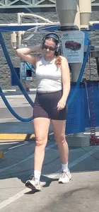 Yummy MILF @ carwash bent over in spandex shorts