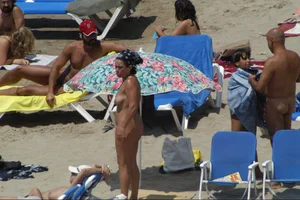 Girls on a nude beach in Sitges, Spain