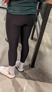 Tight legs and ass in black legging. Bend over