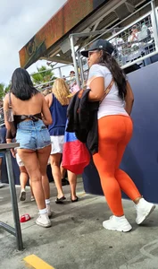 Latina MILF in orange leggings plus booty shorts