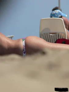 Sexy girls going topless at the beach showing off their sexy bodies