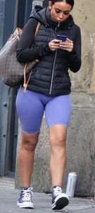 Wide hipped, juicy fronted tanned brunette pawg struts in lycra shorts