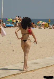 Beach voyeur girls in bikinis, thongs and topless