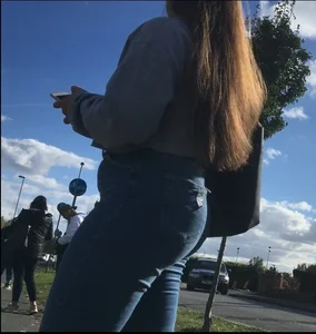 Long haired beauty teen with a tight ass in jeans
