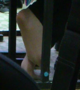 College girls' feet under table