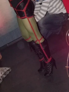 Shibari Girl in Go-Go Boots, Leather Shorts and Green Pantyhose
