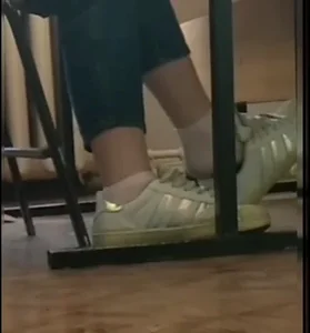 College girl dangle in superstar holo sneakers
