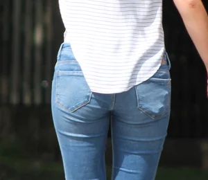 Blonde chick walking with her boyfriend in tight jeans