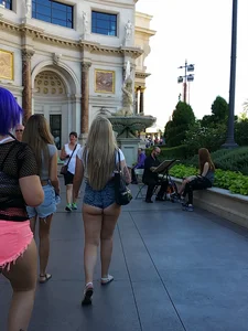Big booty blonde showing a ton of her ass cheeks in shorts