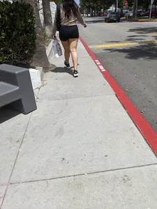 THICK BRUNETTE THIGHS IN GYM SHORTS